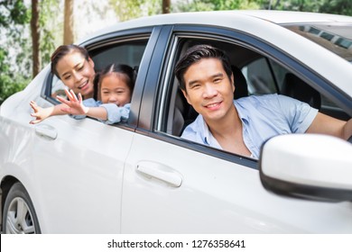 Happy Enjoy Asian Family In Car Driving To Travel In Weekend