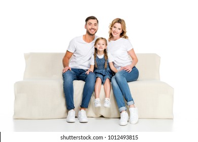 Happy European Family Sitting On Sofa, Isolated On White