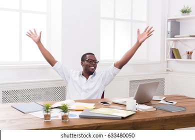 Happy Excited Businessman Celebrate. Winner, Black Man In Office With Laptop