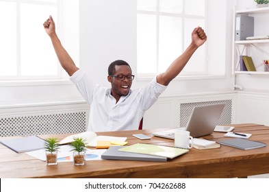 Happy Excited Businessman Celebrate. Winner, Black Man In Office With Laptop