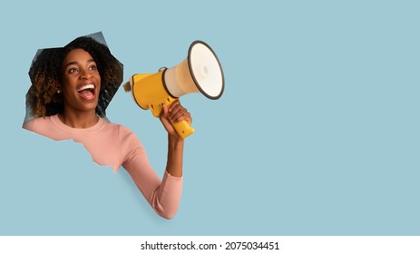 Happy excited funny millennial african american woman with open mouth, shouts in megafon, breaking through hole in blue paper, panorama. Discount, sale at black friday, ad, facial emotions, collage