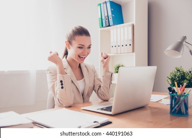 Happy Excited Successful Businesswoman Triumphing In Office