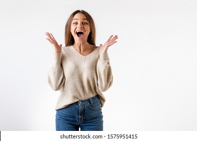 Happy Excited Woman Jumping With Big Smile Isolated Over White