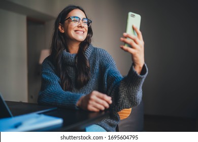 Happy Excited Woman Talking With Family Online Video Connection Via Mobile Phone, Positive Young Girl Happy To See Friends Virtually In Online Video Call Laughing And Joking, Home Isolation Concept