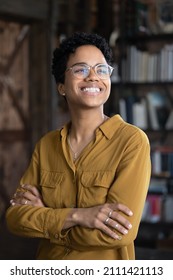 Happy Excited Young Black Business Woman Professional Head Shot Portrait. Female African American Business Leader Looking Away With Toothy Smile Thoughtful Face, Dreaming, Thinking Of Future Career