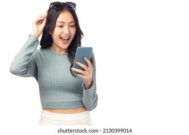 Happy and excited young woman using mobile phone standing over isolated on white background and copy space Young girl using smartphone for shopping online chat and texting message She get surprised - Shutterstock ID 2130399014