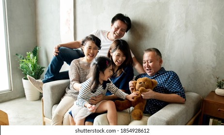 Happy Extended Asian Family Spending Time Together