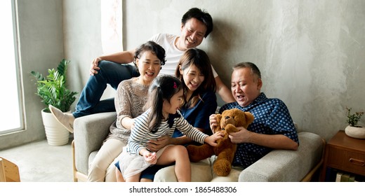 Happy Extended Asian Family Spending Time Together