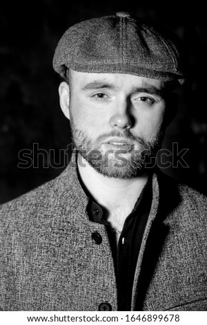 Similar – bearded guy in a cap