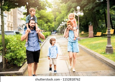 Happy Familly In The Park