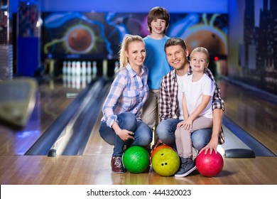 Happy Family At Bowling