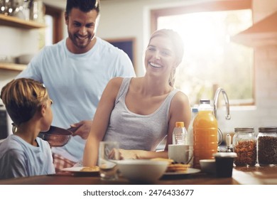 Happy family, breakfast and portrait in kitchen for nutrition, mother and healthy meal in morning. Parents, kid and smile at table for pancakes, brunch or wellness while together at home for bonding - Powered by Shutterstock