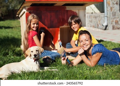 Happy Family Building A Doghouse For Their Little Labrador Puppy - Painting