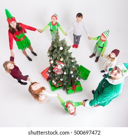 Happy Family Celebrating Christmas Near Cristmas Stock Photo 500697472