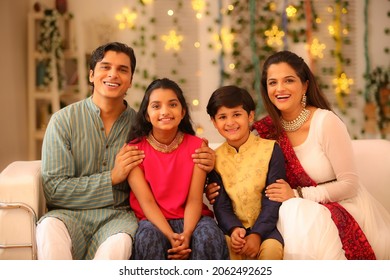 happy family celebrating diwali festival with full of happiness - Shutterstock ID 2062492625
