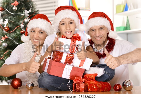 Happy Family Celebrating New Year Home Stock Photo (Edit Now) 234826327