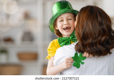 Happy family celebrating St. Patrick's Day. - Powered by Shutterstock