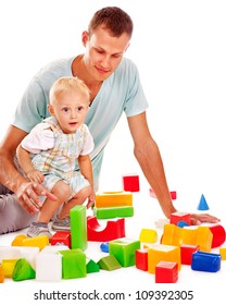 Happy Family With Child Playing Building Blocks. Isolated.