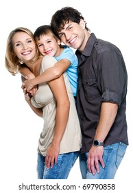 Happy Family With Child Posing On White Background