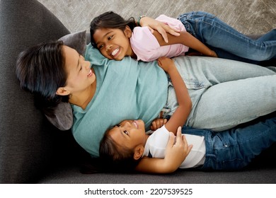 Happy Family, Children And Mother Bonding On A Sofa With Her Daughter, Relax And Happy In A Living Room From Above. Love, Kids And Mom Laughing And Loving, Enjoying Time Together And Being A Parent