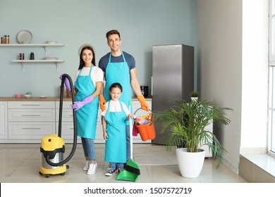 Happy Family Cleaning Kitchen Together