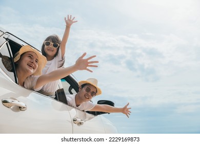 Happy family day. Asian Dad, mom and daughter little kid smiling sitting in compact car windows raise hand wave goodbye, Summer at beach, Car insurance, Family holiday vacation travel, road trip - Shutterstock ID 2229169873