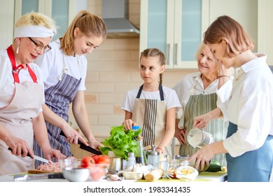 Happy Family Of Different Generations Cooking Together, Chopping Food For Lunch, Preparing Delicious Tasty Meal For Family, Having Talk, Teach And Learn Cooking, Grandparents And Grandchildren