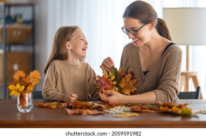 Happy Family Doing Autumn Decor. Fall Atmosphere