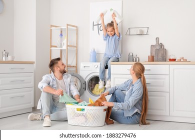 Happy Family Doing Laundry At Home