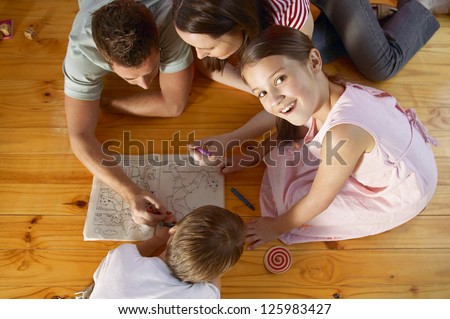 Happy family drawing and spending time together
