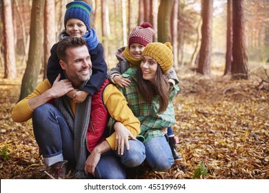 Happy Family During The Autumn