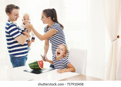 Happy Family Eating Watermelon