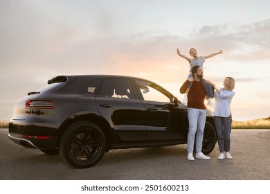 Happy family enjoying road trip. Parents and daughter near car - Powered by Shutterstock