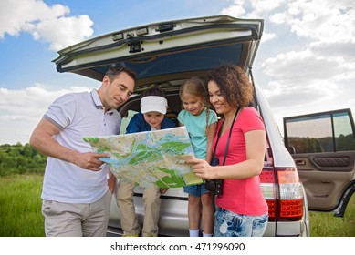 Happy Family Enjoying Road Trip And Summer Vacation