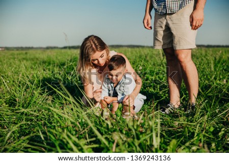Happy family enjoying together in summer day.