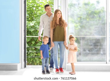 Happy Family Entering New House