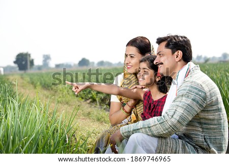 Similar – Man holding hot dog in barbecue with friends