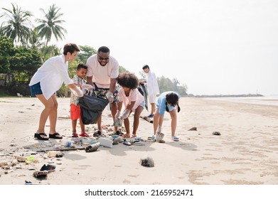 Happy family garbage waste on the beach	 - Powered by Shutterstock