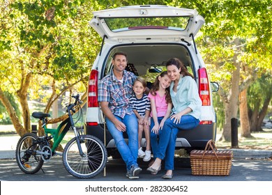 Happy Family Getting Ready For Road Trip On A Sunny Day