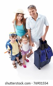 A Happy Family Going On Holiday On A White Background