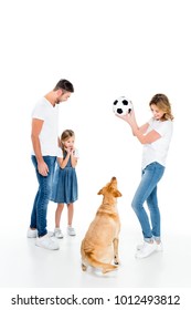 Happy Family And Golden Retriever Dog Playing With Soccer Ball, Isolated On White