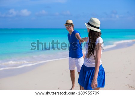 Happy family have fun on Caribbean beach vacation