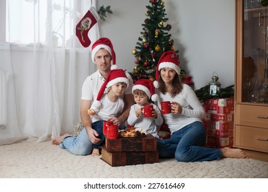 Happy Family Having Breakfast On Christmas