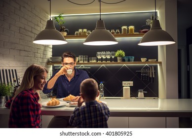 Happy Family Having Breakfast Together.