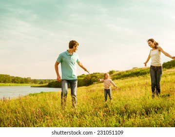 Happy Family Having Fun Outdoors