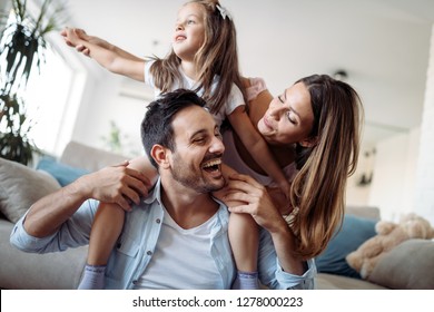 Happy family having fun time at home - Shutterstock ID 1278000223