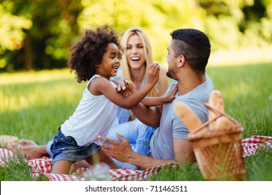 Happy Family Having Fun Time On Picnic