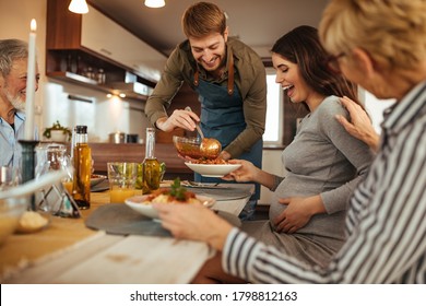 Happy family having a meal together