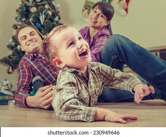 Happy Family At Home In Christmas Time