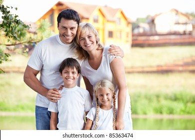 Happy family homes on the background
